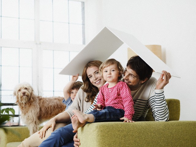 Parents with two kids (2-3,4-5) imagining their future home together