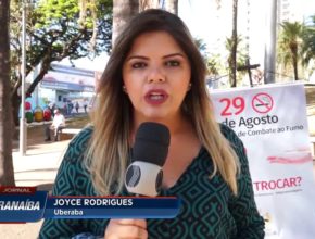 Reportagem/TV Paranaíba (Record TV) - Escola de Uberaba troca cigarros por flores e futas